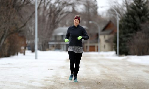 TREVOR HAGAN / WINNIPEG FREE PRESS
Over the past year, Julie Navitka ran to every park and green space in the city, finishing this afternoon at Lord Avenue Park, Sunday, March 4, 2018.