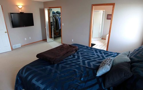 BORIS MINKEVICH / WINNIPEG FREE PRESS
63 Duncan Norrie Drive in Lindenwoods. Realtor Dave Heinrichs. Master bedroom. TODD LEWYS STORY March 6, 2018