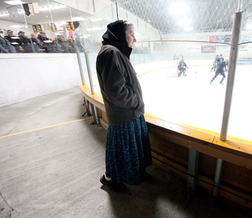 PHIL HOSSACK / WINNIPEG FREE PRESS - Baker Community's Pauline Maendel watches closely as her daughters play with the Baker Storm against the Iron Maidens at a community charity game against the Iron Maidens in MacGregor . See Melissa Martin's story. February 23, 2018