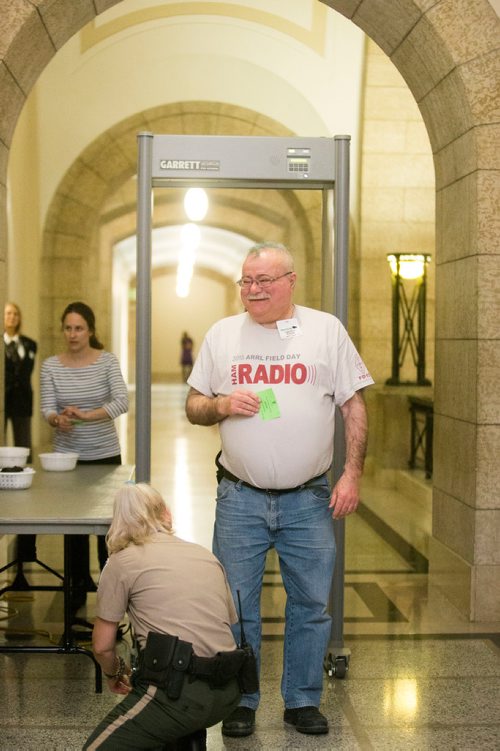 MIKAELA MACKENZIE / WINNIPEG FREE PRESS
Gary Goodman goes through the new metal detectors for people entering the visitors gallery at the Manitoba Legislature in Winnipeg, Manitoba on Wednesday, March 7, 2018.
180307 - Wednesday, March 07, 2018.
