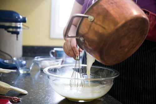 MIKAELA MACKENZIE / WINNIPEG FREE PRESS
Nadine Peloquin, owner of Hocus Pocus Pies & Dice, bakes a chocolate custard pie in her home in St. Vital in Winnipeg, Manitoba on Wednesday, March 7, 2018.
180307 - Wednesday, March 07, 2018.