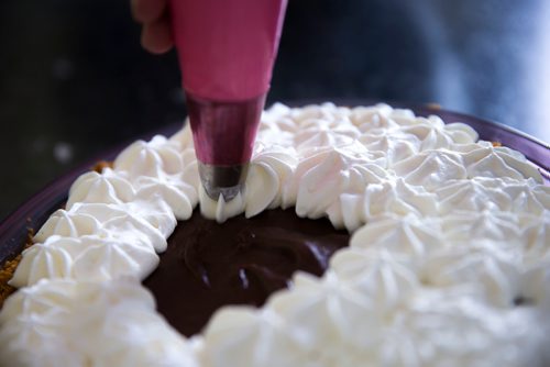 MIKAELA MACKENZIE / WINNIPEG FREE PRESS
Nadine Peloquin, owner of Hocus Pocus Pies & Dice, bakes a chocolate custard pie in her home in St. Vital in Winnipeg, Manitoba on Wednesday, March 7, 2018.
180307 - Wednesday, March 07, 2018.