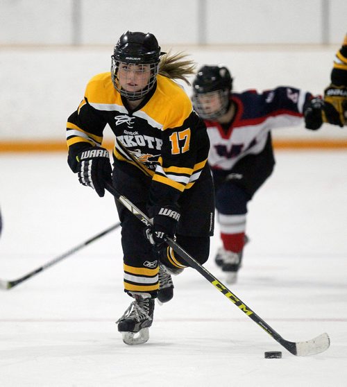 PHIL HOSSACK / WINNIPEG FREE PRESS -  Dakota Lancer #17 Neve Borsboom moves the puck towards the St. Marys Acadamy net in playoff action at Dakota Community Centre Wednesday. - March 7, 2018