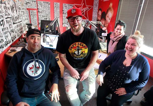 BORIS MINKEVICH / WINNIPEG FREE PRESS
Ace Burpee does his morning show at Virgin 103. Ace does a crazy amount of charity work around the province. From left, Kevin 'Lloyd' Frobisher, Ace Burpee, Amber Saleem, and Chrissy Troy pose for a photo in the studio. RANDY TURNER STORY. March 6, 2018