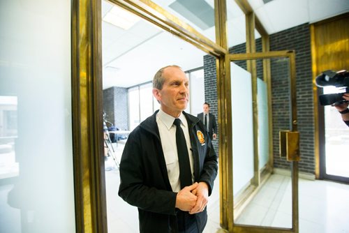 MIKAELA MACKENZIE / WINNIPEG FREE PRESS
Fire and Paramedic Chief John Lane exits the room after speaking to the media at city hall in Winnipeg, Manitoba on Thursday, March 8, 2018.
180308 - Thursday, March 08, 2018.