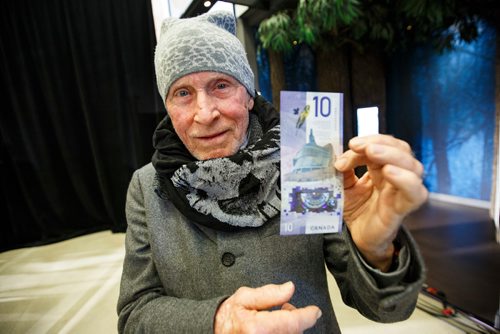 MIKE DEAL / WINNIPEG FREE PRESS
The architect of the CMHR building, Antoine Predock, checks out the new $10 bill.
At a simultaneous ceremony held at the Canadian Museum for Human Rights in Winnipeg and the Halifax Central Library in Nova Scotia, Canada's new $10 banknote, featuring a portrait of human rights defender Viola Desmond on the front and the CMHR on the back, was unveiled. 
180308 - Thursday, March 08, 2018.