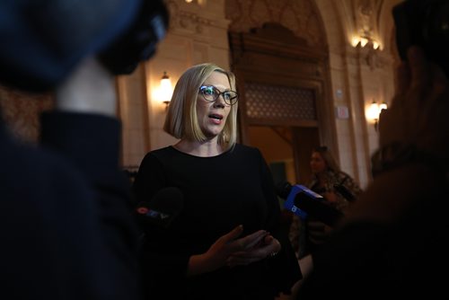 RUTH BONNEVILLE / WINNIPEG FREE PRESS

Minister Rochelle Squires, minister responsible for the status of women, answers questions from the media just outside the Crystal Ballroom at the Hotel Fort Garry prior to launch of the Status of Women in Manitoba report luncheon on International Women's Day Thursday.

March 08 ,2018