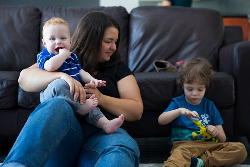 MIKAELA MACKENZIE / WINNIPEG FREE PRESS
Mom Jamie Streilein and her sons Keaton, three, and Elliot, nine months, at their home in Sage Creek in Winnipeg, Manitoba on Sunday, March 11, 2018. The Streilein family, as well as others in the subdivision, have little to no hope of getting their kids into the school in the area.
180311 - Sunday, March 11, 2018.