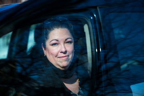 MIKAELA MACKENZIE / WINNIPEG FREE PRESS
Christine Brouzes, co-director of Ikwe Safe Rides - Women Helping Women, poses with her car on McMillan Avenue in Winnipeg, Manitoba on Sunday, March 11, 2018.
 Mikaela MacKenzie / Winnipeg Free Press 11, 2018.