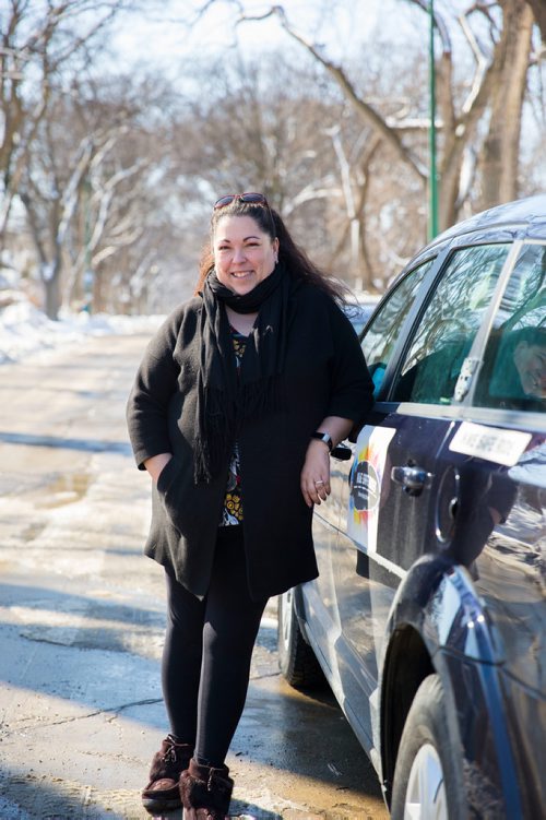 MIKAELA MACKENZIE / WINNIPEG FREE PRESS
Christine Brouzes, co-director of Ikwe Safe Rides - Women Helping Women, poses with her car on McMillan Avenue in Winnipeg, Manitoba on Sunday, March 11, 2018.
 Mikaela MacKenzie / Winnipeg Free Press 11, 2018.