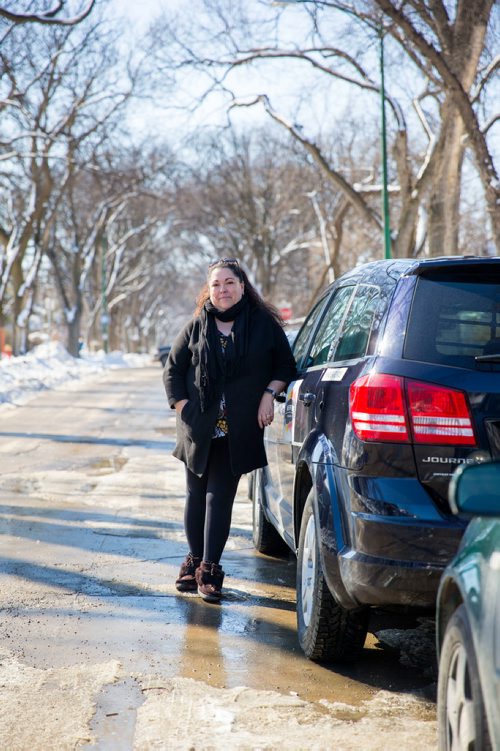 MIKAELA MACKENZIE / WINNIPEG FREE PRESS
Christine Brouzes, co-director of Ikwe Safe Rides - Women Helping Women, poses with her car on McMillan Avenue in Winnipeg, Manitoba on Sunday, March 11, 2018.
 Mikaela MacKenzie / Winnipeg Free Press 11, 2018.