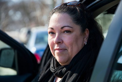 MIKAELA MACKENZIE / WINNIPEG FREE PRESS
Christine Brouzes, co-director of Ikwe Safe Rides - Women Helping Women, poses with her car on McMillan Avenue in Winnipeg, Manitoba on Sunday, March 11, 2018.
 Mikaela MacKenzie / Winnipeg Free Press 11, 2018.