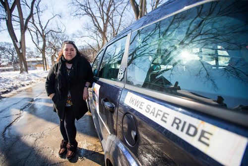 MIKAELA MACKENZIE / WINNIPEG FREE PRESS
Christine Brouzes, co-director of Ikwe Safe Rides - Women Helping Women, poses with her car on McMillan Avenue in Winnipeg, Manitoba on Sunday, March 11, 2018.
 Mikaela MacKenzie / Winnipeg Free Press 11, 2018.