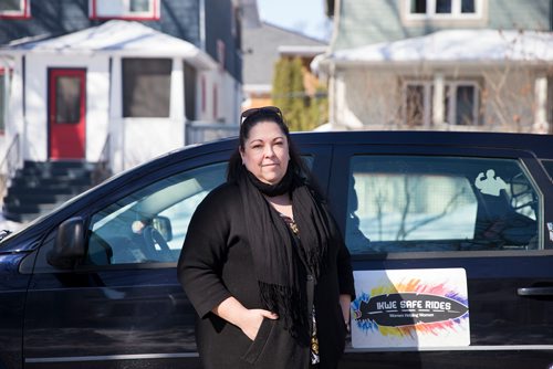 MIKAELA MACKENZIE / WINNIPEG FREE PRESS
Christine Brouzes, co-director of Ikwe Safe Rides - Women Helping Women, poses with her car on McMillan Avenue in Winnipeg, Manitoba on Sunday, March 11, 2018.
 Mikaela MacKenzie / Winnipeg Free Press 11, 2018.