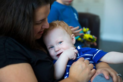 MIKAELA MACKENZIE / WINNIPEG FREE PRESS
Mom Jamie Streilein and her sons Keaton, three, and Elliot, nine months, at their home in Sage Creek in Winnipeg, Manitoba on Sunday, March 11, 2018. The Streilein family, as well as others in the subdivision, have little to no hope of getting their kids into the school in the area.
180311 - Sunday, March 11, 2018.