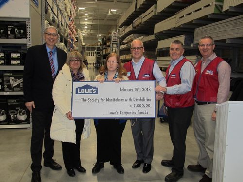 SUBMITTED PHOTO

L-R: Society for Manitobans with Disabilities CEO Dana Erickson, SMD Foundation COO Maria Marrone and SMD Ambassador Jocelyne Yanofsky receive a grant for $5,0000 from representatives of Lowe's during the home-improvement store's grand opening celebration on Feb. 15, 2018 at 1799 Kenaston Blvd. (See Social Page)