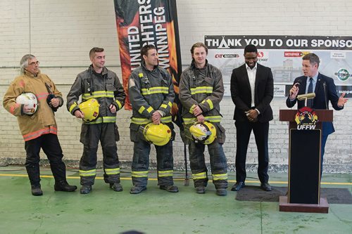 Canstar Community News March 6, 2018 - Winnipeg firefighters launch the annual rooftop campout in support of Muscular Dystrophy Manitoba at Osborne Village firehall No. 4.They are pictured with Winnipeg Mayor Brian Bowman. (DANIELLE DA SILVA/CANSTAR/SOUWESTER)