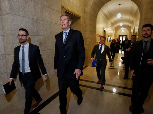 PHIL HOSSACK / WINNIPEG FREE PRESS - Premier Brian Pallister followed by his Minsiter of Finance Cameron Friesen leave the chamber post budget reading at the Manitoba Legislature Monday.  - March 12, 2018