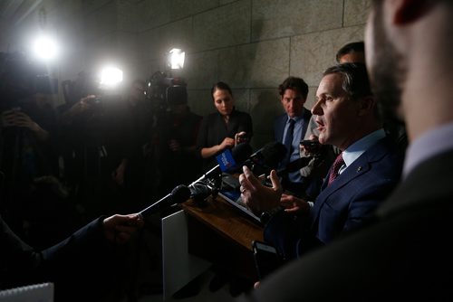 JOHN WOODS / WINNIPEG FREE PRESS
Cameron Friesen, Minister of Finance, speaks to media outside question period about yesterday's Manitoba budget Tuesday, March 13, 2018.