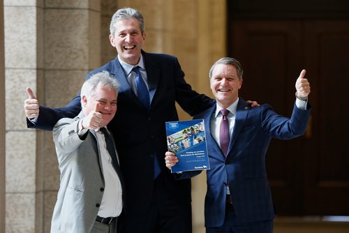 JOHN WOODS / WINNIPEG FREE PRESS
From left, Chisholm Pothier, PC Director of Communications, Manitoba Premier, Brian Pallister, and Cameron Friesen, Minister of Finance give a thumbs up after responding at question period and speaking with media about yesterday's Manitoba budget Tuesday, March 13, 2018.