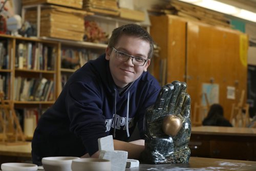 RUTH BONNEVILLE / WINNIPEG FREE PRESS

Grade 12 Sister High School Art student  Donovan Saunders, pictured here with his award winning soapstone sculpture called The Hand of Economy, in his art class at Sisler Tuesday.  

Saunder's sculpture recently won an honourable mention at Eksperimenta! exhibition in Tallinn, Estonia. 

Sister is proud of all the Sisler art students whose art work was selected to be shown at the prestigious exhibition around hundreds of entries from around the world.   Names of Sisler students whose work was in competition: Francis Novilla, Jenna Li, Aaron Legaspi & Ellina Pe Benito, JR Millar, Angela Aguila, Vincent Reyes and Donovan Saunders.   

The theme for the triennial event was Art and the Economy, and artists from all over the world competed to have their works seen on an international stage.  

Standup 

March 13 ,2018