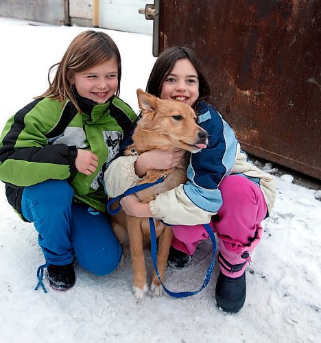 BORIS MINKEVICH / WINNIPEG FREE PRESS  081201 Calli Vanderaa, right, and her friend Sabannah Cadotte with the dog Calli found in a dumpster in behind their house.