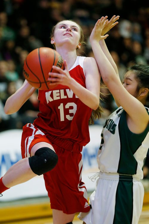 JOHN WOODS / WINNIPEG FREE PRESS
Kelvin Clips' Brenna Morton (13) makes the two-pointer against Vincent Massey Trojans' Breanna Him (2) in the 2018 JV Basketball Provincial Championship at the University of Manitoba Tuesday, March 13, 2018. Kelvin defeated Vincent Massey.