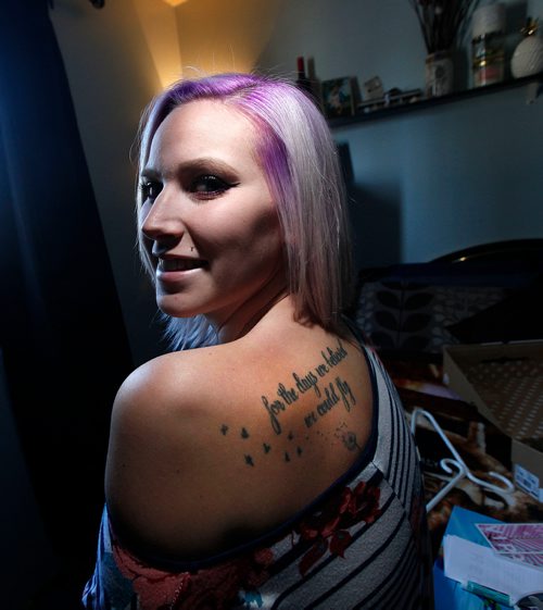 PHIL HOSSACK / WINNIPEG FREE PRESS - Hedley fan Toni-Dawn McGrath shows off her tattoo, a quote from one of the bands songs, on her right shoulder. See Jenn Zorati's story. - March 14, 2018