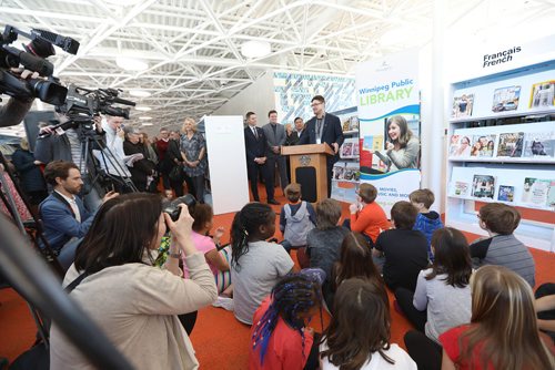 RUTH BONNEVILLE  /  WINNIPEG FREE PRESS

Local: New Windsor Park Library opening.
Matt Allard, City Councillor for St. Boniface speaks at the podium with Mayor Brian Bowman and Councillor Mike Pagtakhan next to him to  grade 2 & 3 students from  École Howden School, media and others who attended the  formal opening of new local Library on Thursday at 1195 Archibald Street.




March 15, 2018