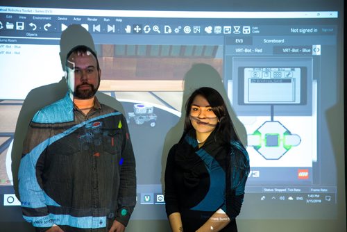 MIKAELA MACKENZIE / WINNIPEG FREE PRESS
Lead robotics instructor Chris Schulz (left) and robotics coordinator Alexis Nelson at the First Peoples Development Inc. offices in Winnipeg on Thursday, March 15, 2018. First Peoples Development Inc. has teamed up with a Winnipeg robotics company called Cogmation to deliver two-week long robotics coding workshops in First Nations in Manitoba that culminate in a Lego robot Sumo wrestling competition.
 Mikaela MacKenzie / Winnipeg Free Press 15, 2018.