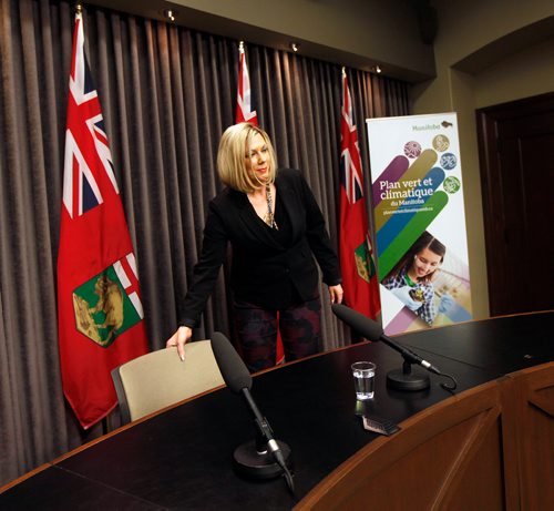 PHIL HOSSACK / WINNIPEG FREE PRESS - Conservative Sustainable Development Minister Rochelle Squires takes her seat in the briefing room before answering questions re: the Conservative Government's new "Climate Plan". - March 15, 2018