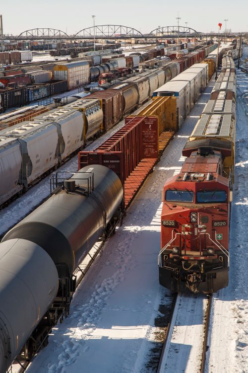 MIKE DEAL / WINNIPEG FREE PRESS
Trains in the CP rail yard sit idle Thursday afternoon.
180315 - Thursday, March 15, 2018.