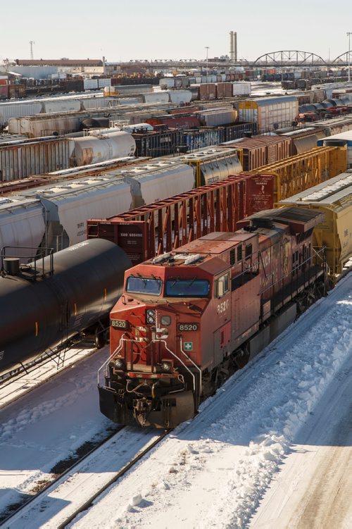 MIKE DEAL / WINNIPEG FREE PRESS
Trains in the CP rail yard sit idle Thursday afternoon.
180315 - Thursday, March 15, 2018.