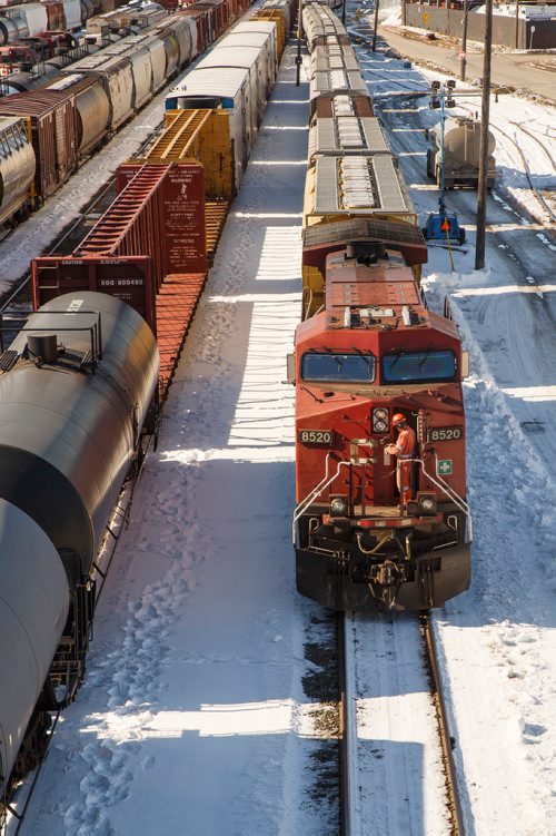 MIKE DEAL / WINNIPEG FREE PRESS
Trains in the CP rail yard sit idle Thursday afternoon.
180315 - Thursday, March 15, 2018.