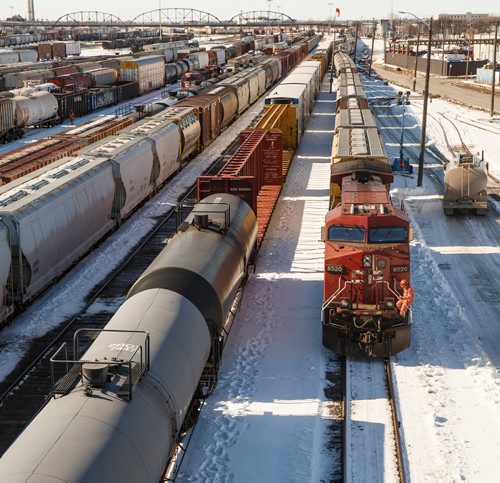 MIKE DEAL / WINNIPEG FREE PRESS
Trains in the CP rail yard sit idle Thursday afternoon.
180315 - Thursday, March 15, 2018.