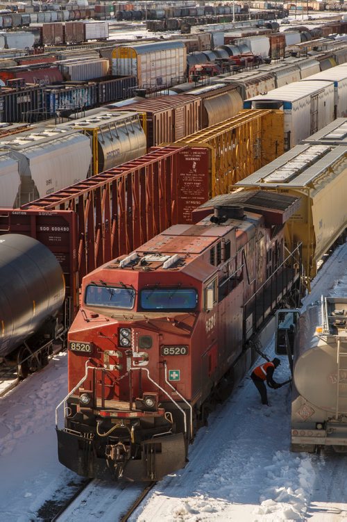 MIKE DEAL / WINNIPEG FREE PRESS
Trains in the CP rail yard sit idle Thursday afternoon.
180315 - Thursday, March 15, 2018.