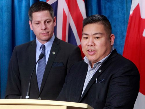BORIS MINKEVICH / WINNIPEG FREE PRESS
City releases 2018 State of the Infrastructure Report. From left, Mayor Brian Bowman listens to Councillor Mike Pagtakhan, Council Liaison for Project Management as he addresses the media at the Council Building, Lower Level  News Conference Room. ALDO SANTIN STORY. March 16, 2018