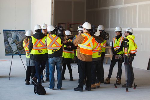 MIKE DEAL / WINNIPEG FREE PRESS
Jim Ludlow (third from left), President of True North Real Estate Development, during a short tour of the construction at True North Square, Friday March 16, 2018.
180316 - Friday, March 16, 2018.