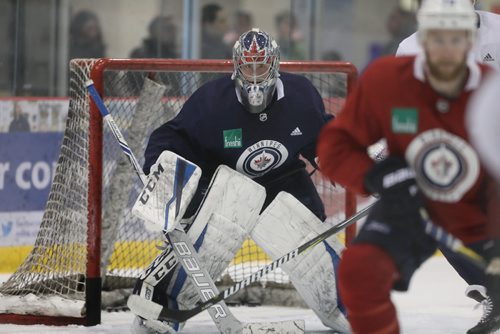 RUTH BONNEVILLE  /  WINNIPEG FREE PRESS

Jets Goalie, Eric Comrie on ice during practice with The Winnipeg Jets at MTS Iceplex Saturday. 

March 17, 2018