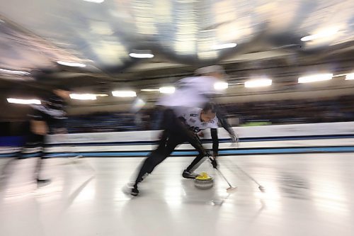 TREVOR HAGAN / WINNIPEG FREE PRESS
Mike McEwen throws a rock versus Brad Gushue at the Grand Slam of Curling, Sunday, March 18, 2018.