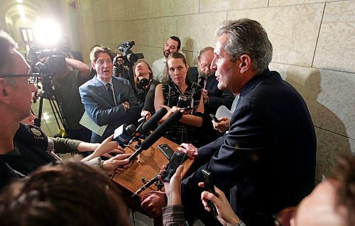 BORIS MINKEVICH / WINNIPEG FREE PRESS
Manitoba Premier Brian Pallister in scrummed by the media in a second floor hallway at the Manitoba Legislative Building. Re: Hydro board quitting. March 21, 2018