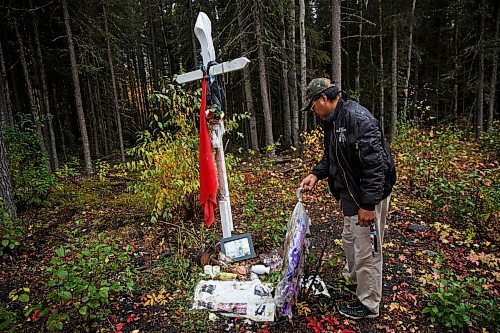 MIKE DEAL / WINNIPEG FREE PRESS 
Band councillor Larry Watt at the site of the memorial in the woods close to the garbage dump where the body of Krystal Andrews was found in God's Lake Narrows First Nation.
170927 - Wednesday, September 27, 2017.