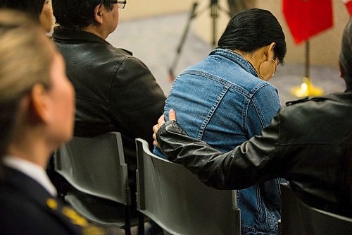 MIKAELA MACKENZIE / WINNIPEG FREE PRESS
Family members comfort each other as the RCMP announce that they have charged a man with murder for the death of Crystal Andrews at the division headquarters in Winnipeg on Thursday, March 22, 2018. 
Mikaela MacKenzie / Winnipeg Free Press 22, 2018.