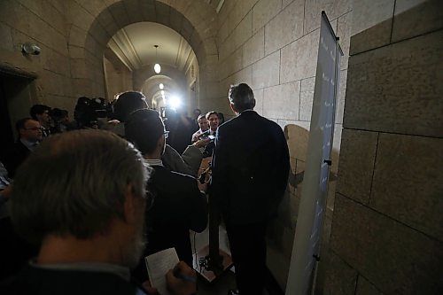 RUTH BONNEVILLE  /  WINNIPEG FREE PRESS

Premier Brian Pallister holds media scrum over the MB Hydro board resigning, after question period in the Legislature Thursday.  

March 22,  2018