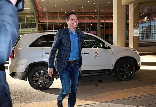 MIKE DEAL / WINNIPEG FREE PRESS
Mayor Brian Bowman arrives at the convention centre via ride share company, Tapp Car, prior to his big State of the City luncheon. 
180323 - Friday, March 23, 2018.