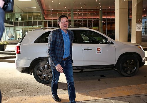 MIKE DEAL / WINNIPEG FREE PRESS
Mayor Brian Bowman arrives at the convention centre via ride share company, Tapp Car, prior to his big State of the City luncheon. 
180323 - Friday, March 23, 2018.