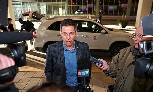 MIKE DEAL / WINNIPEG FREE PRESS
Mayor Brian Bowman arrives at the convention centre via ride share company, Tapp Car, prior to his big State of the City luncheon. 
180323 - Friday, March 23, 2018.