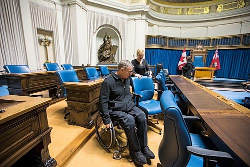 MIKAELA MACKENZIE / WINNIPEG FREE PRESS
Rick Hansen is given a tour of the accessibility features in the chamber by speaker Myrna Driedger at the Manitoba Legislative Building in Winnipeg on Friday, March 23, 2018. 
Mikaela MacKenzie / Winnipeg Free Press 23, 2018.