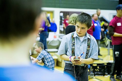 MIKAELA MACKENZIE / WINNIPEG FREE PRESS
Josiah Wollman, 11, puts his robotic creation to the test at the annual Manitoba Robot Games at the Technical Vocational High School in Winnipeg on Saturday, March 24, 2018.
Mikaela MacKenzie / Winnipeg Free Press 24, 2018.