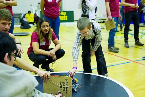 MIKAELA MACKENZIE / WINNIPEG FREE PRESS
Nolan Kleinsasser, 10, puts his robotic creation to the test at the annual Manitoba Robot Games at the Technical Vocational High School in Winnipeg on Saturday, March 24, 2018.
Mikaela MacKenzie / Winnipeg Free Press 24, 2018.